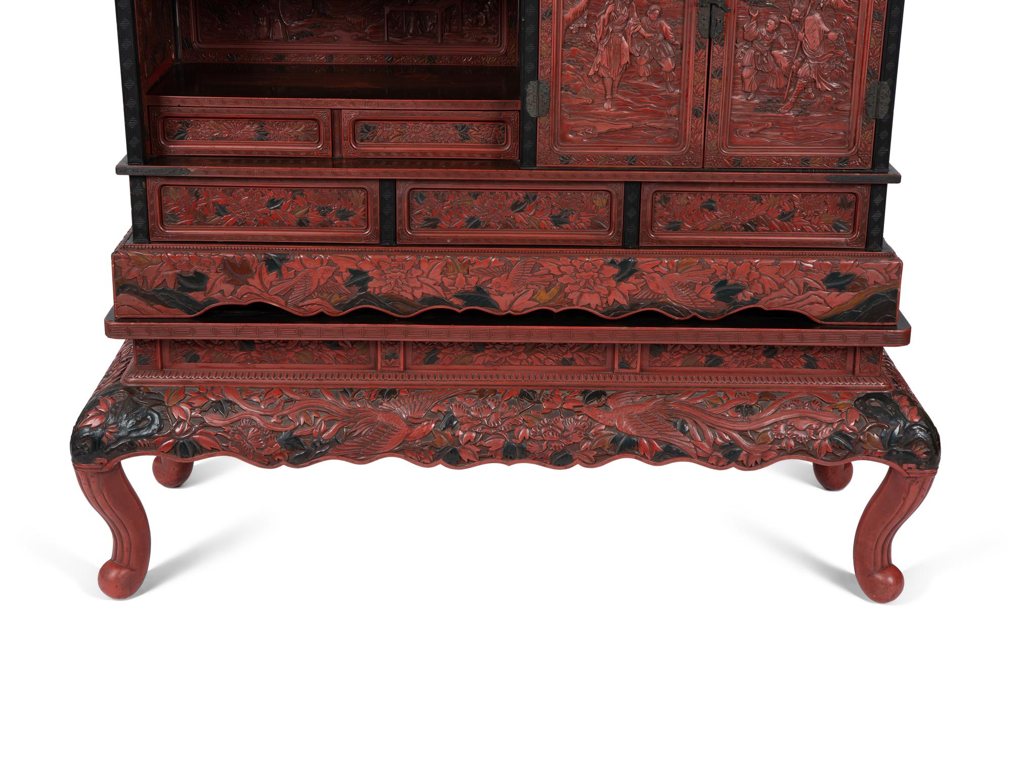 A Chinese Export Carved Red Lacquer Curio Cabinet — EARLY 20TH CENTURY
