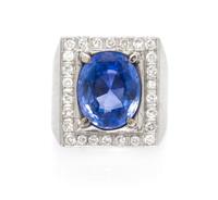 An 18 Karat White Gold, Sapphire and Diamond Ring, 8.30 dwts.
