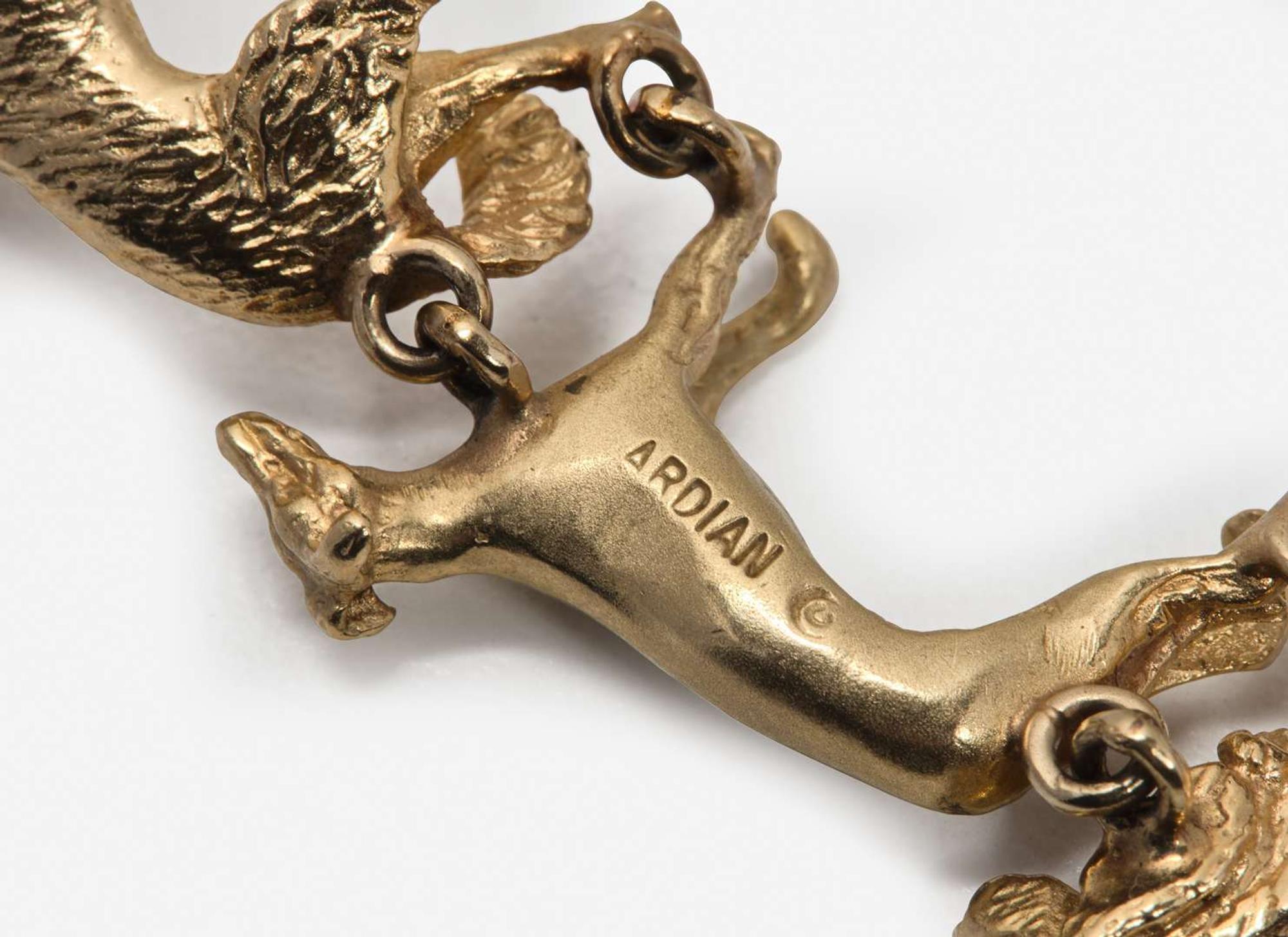 A 14K Yellow Gold Dog Bracelet
