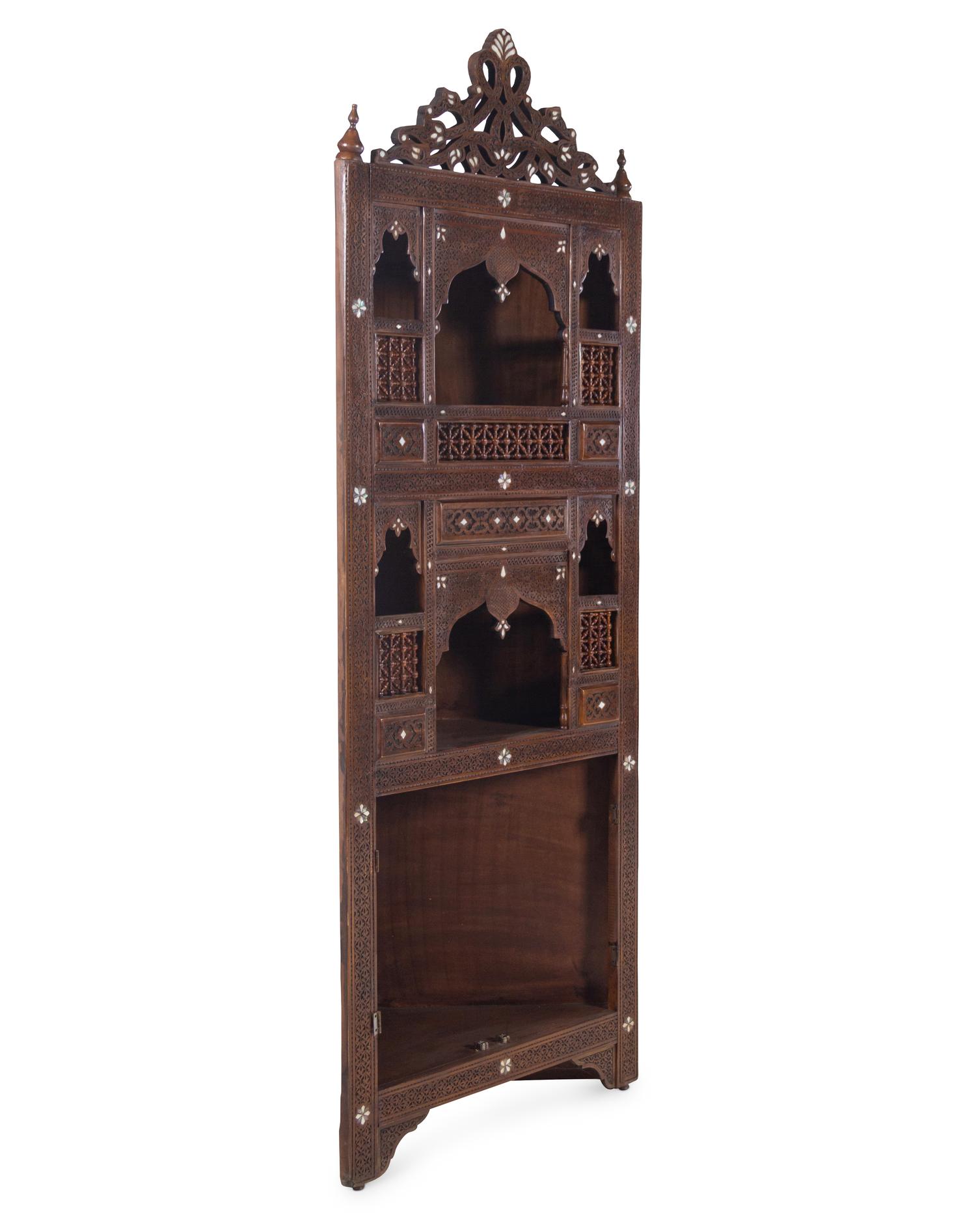 A Pair of Syrian Mother-of-Pearl Inlaid Walnut Corner Cabinets