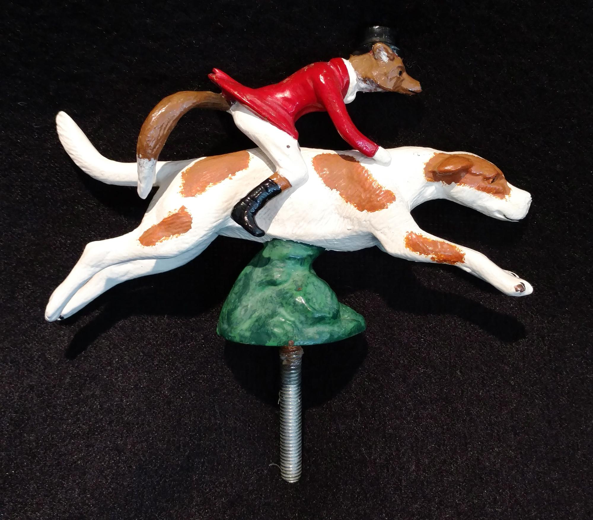 A Pair of LeJeune Car Mascot Fixings