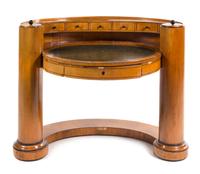 A Biedermeier Fruitwood Writing Table Height 37 x width 46 inches. — SECOND QUARTER 19TH CENTURY