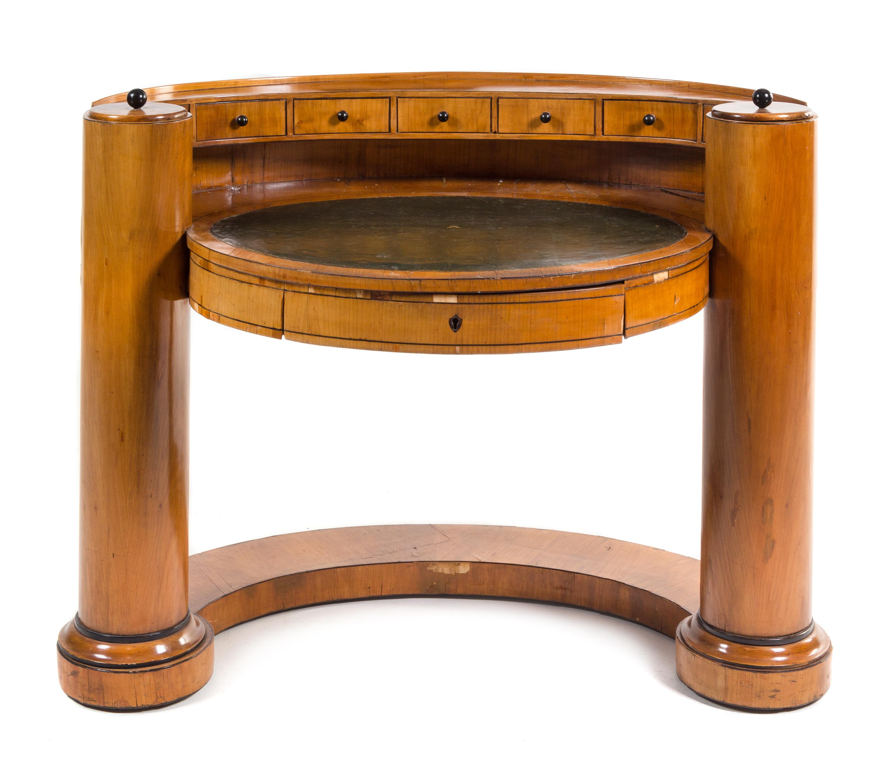 A Biedermeier Fruitwood Writing Table Height 37 x width 46 inches. — SECOND QUARTER 19TH CENTURY
