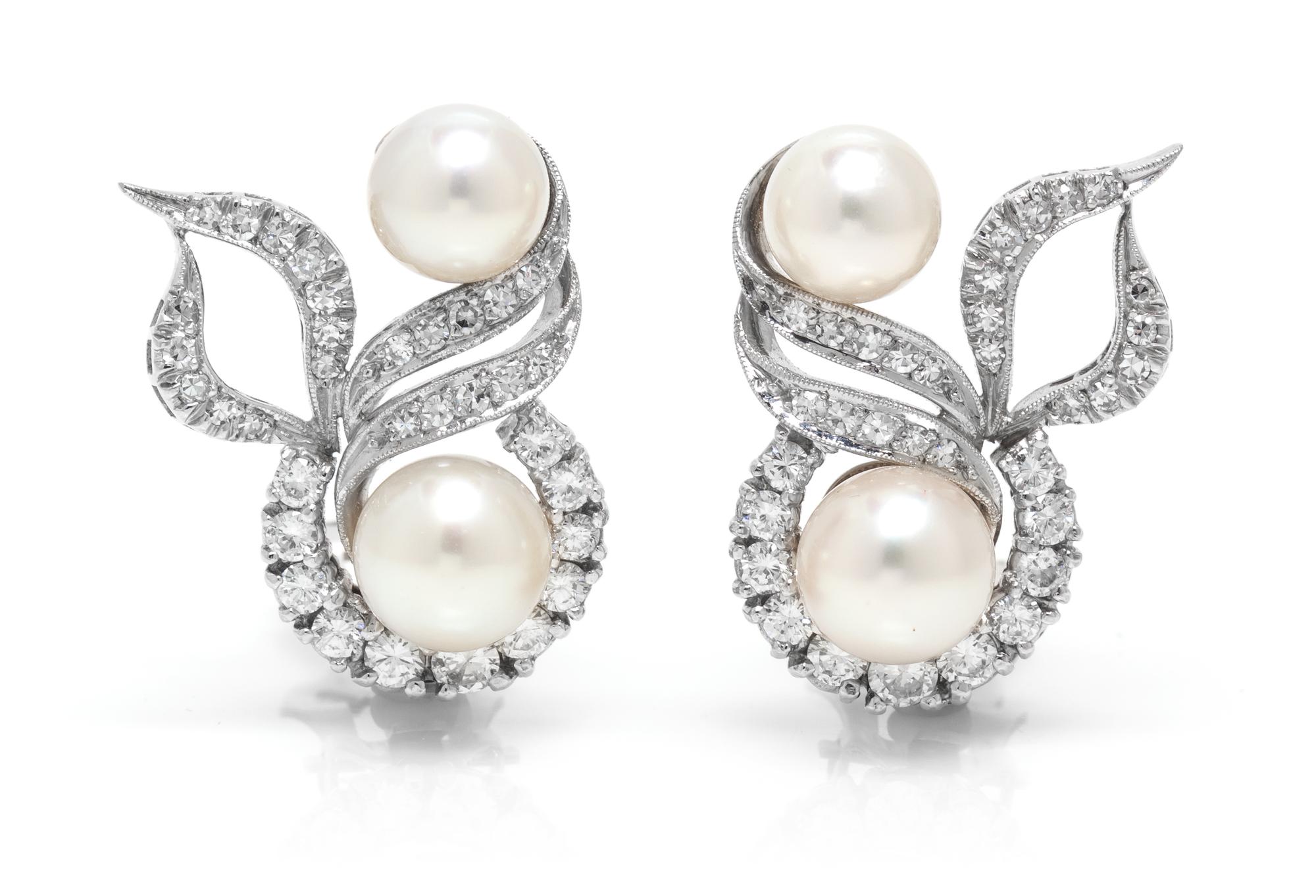 A Pair of White Gold, Pearl and Diamond Earrings, 9.70 dwts.