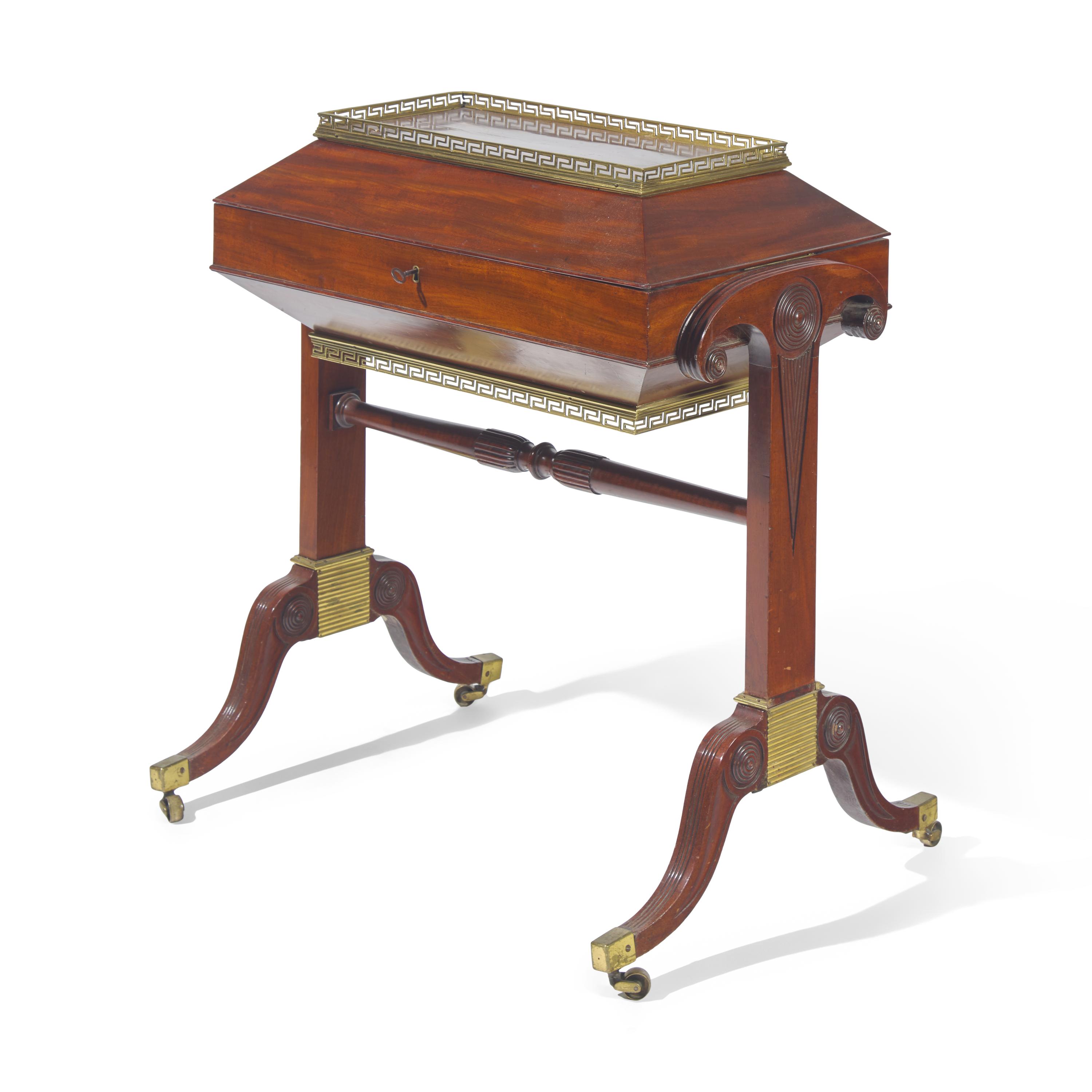 A Neoclassical Pierced Brass Mounted Mahogany Cellarette
