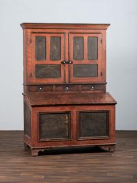 A Country Red and Grain Paint Decorated General Store Dry Goods Storage Cupboard