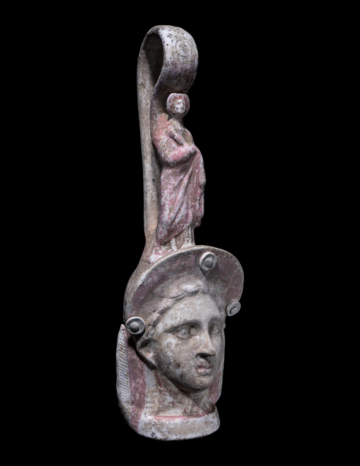 A Canosan Pottery Figural Oinochoe