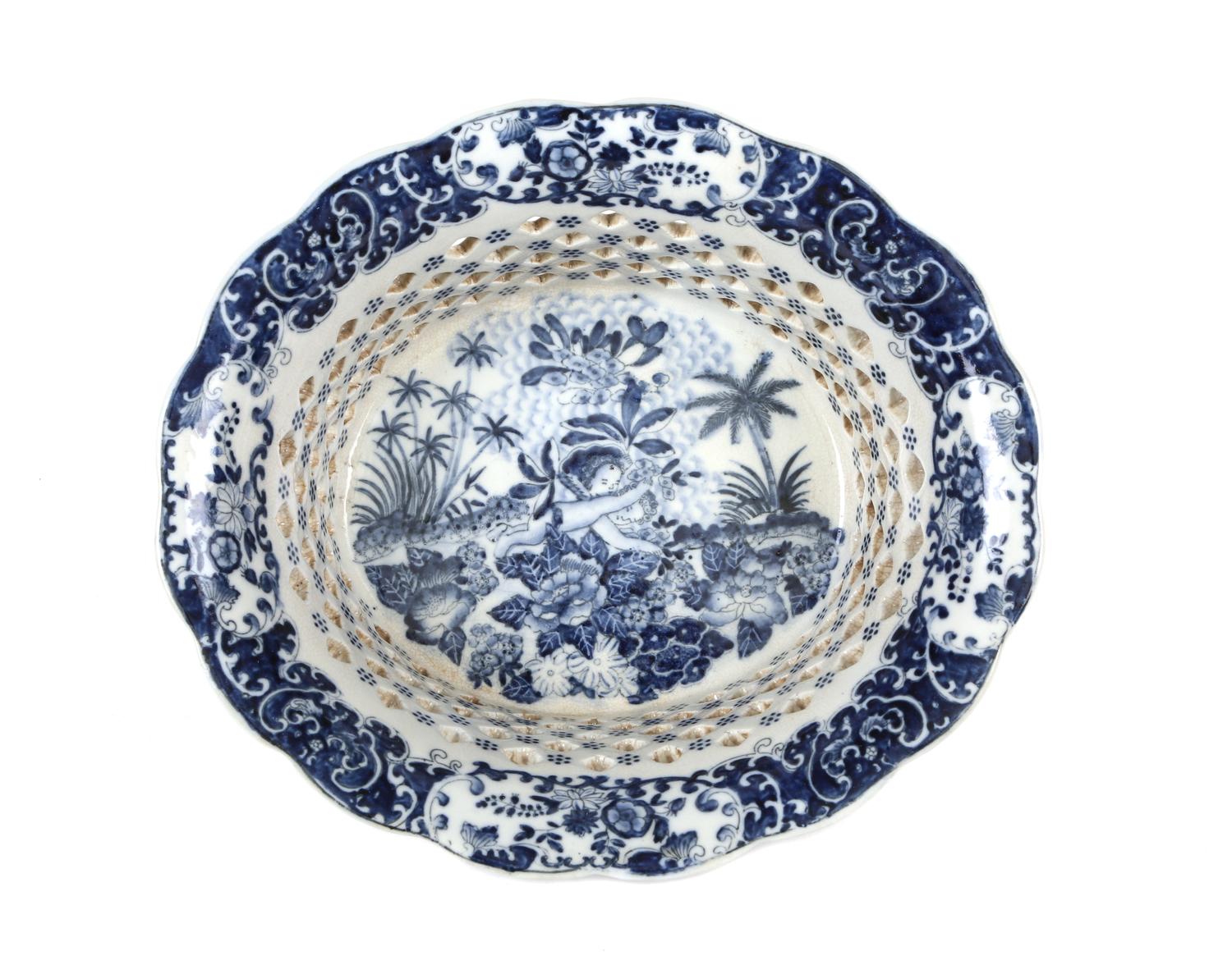 A Chinese Export Blue and White Reticulated Basket Height 5 5/8 x width 12 1/2 inches.