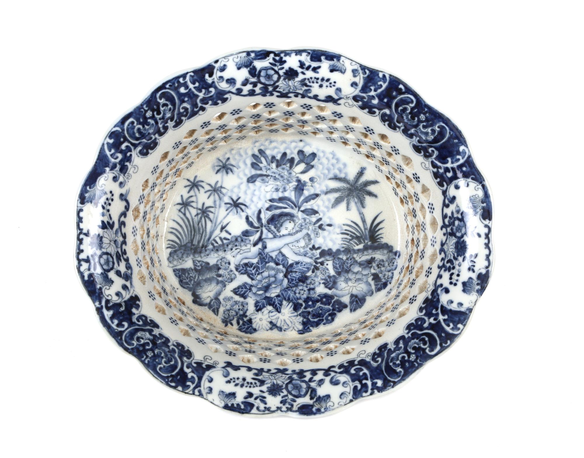 A Chinese Export Blue and White Reticulated Basket Height 5 5/8 x width 12 1/2 inches.