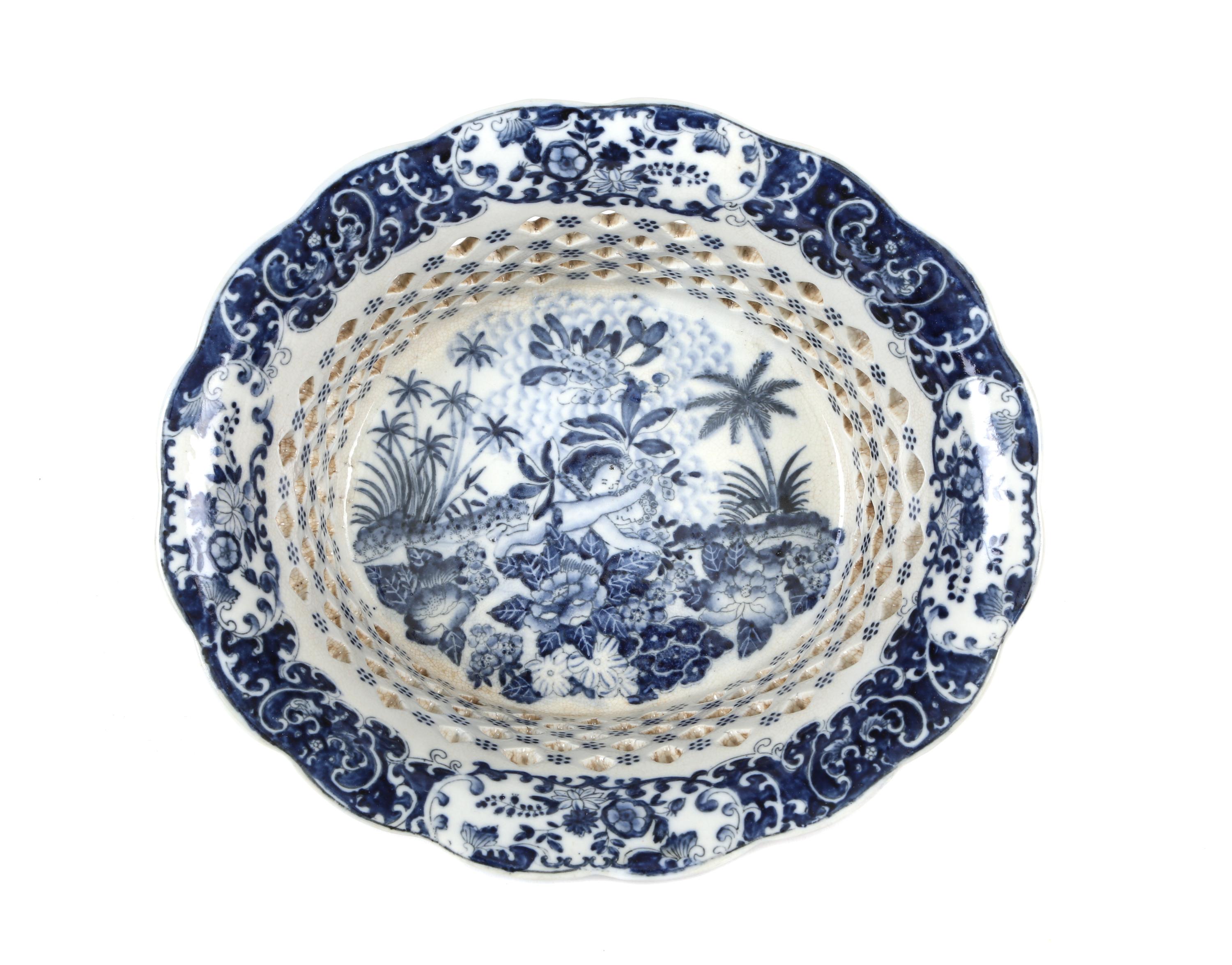 A Chinese Export Blue and White Reticulated Basket Height 5 5/8 x width 12 1/2 inches.