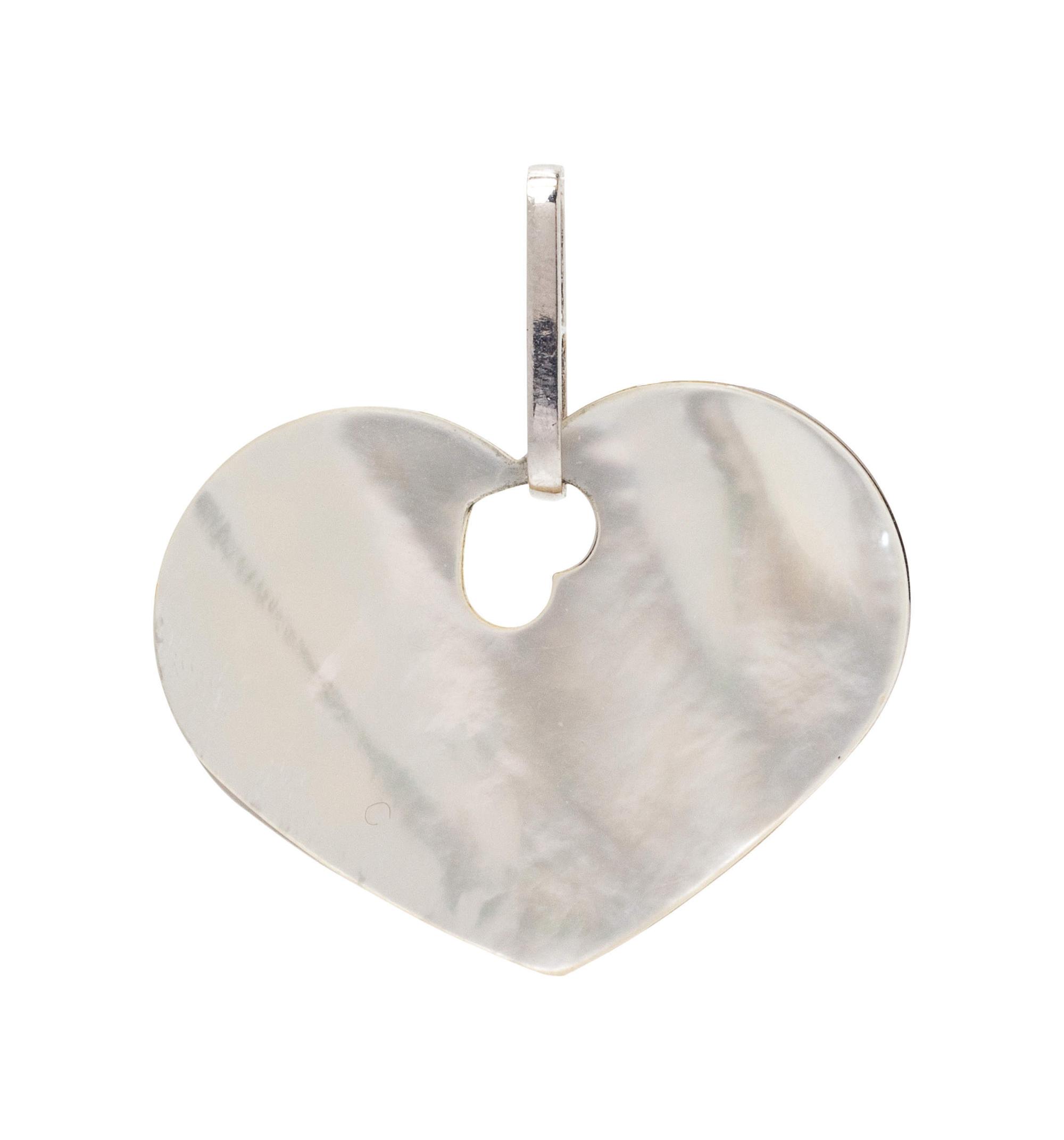 An 18 Karat White Gold, Diamond and Mother-of-Pearl Heart Pendant, Nanis,
