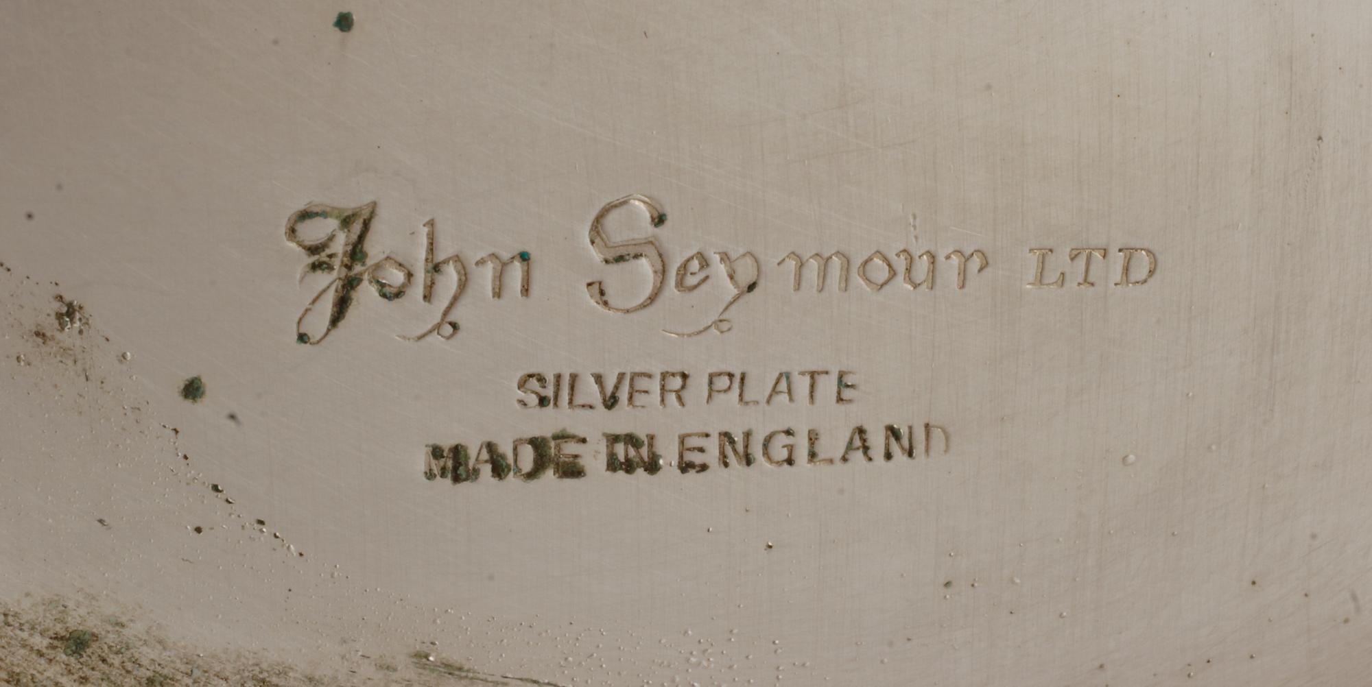 A Pair of English Silver-Plate Wine Coolers, John Seymour Ltd., 20th Century, each of twin-handled campagna form.