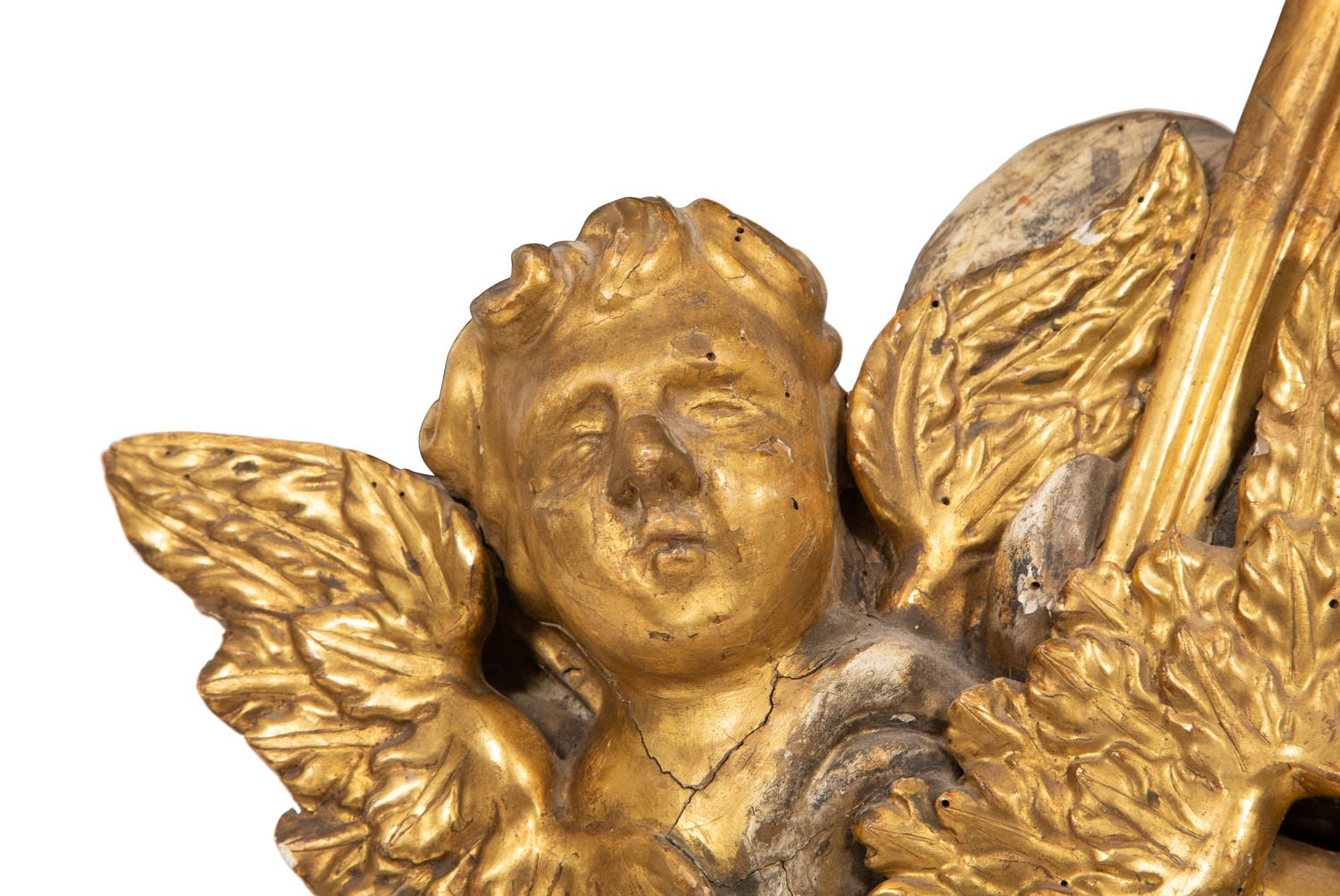 An Italian Carved Giltwood and Silvered Wall Mount