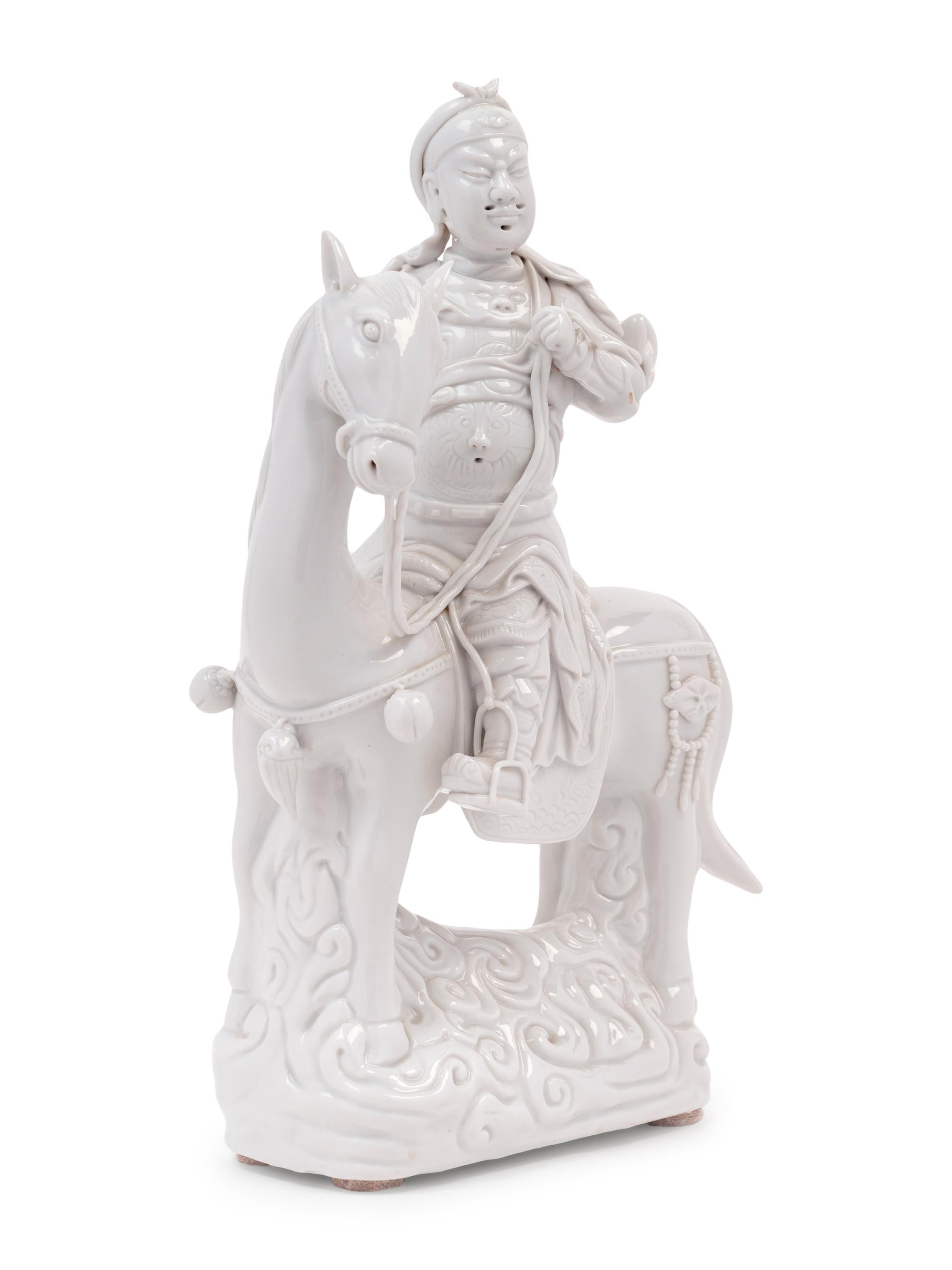 A Chinese Blanc-de-Chine Porcelain Figure of Guangong