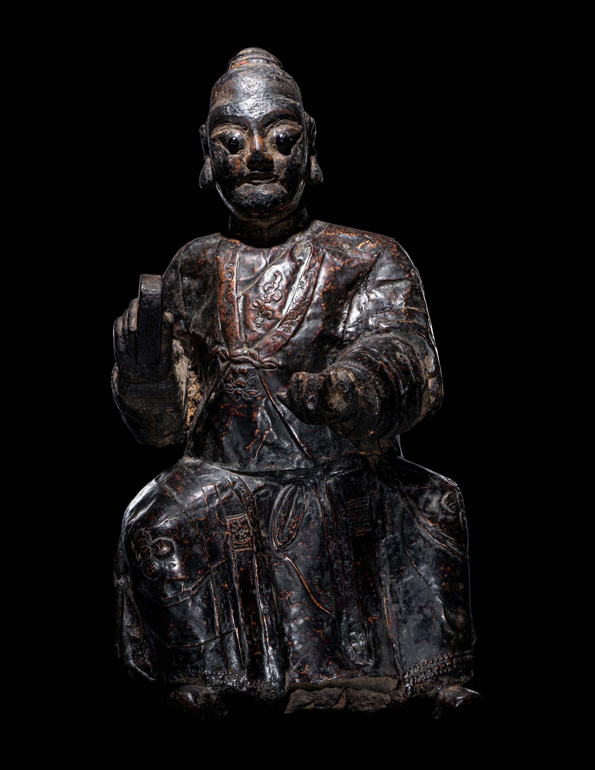 A Chinese Lacquered Wood and Copper Figure of a Daoist Immortal