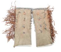 A Pair of Tall Jicarilla Apache Beaded Moccasins Height of first approximately 12 1/2 inches.
