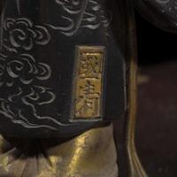 A Japanese patinated metal okimono signed Kunikiyo 日本金属置物 Meiji period ??