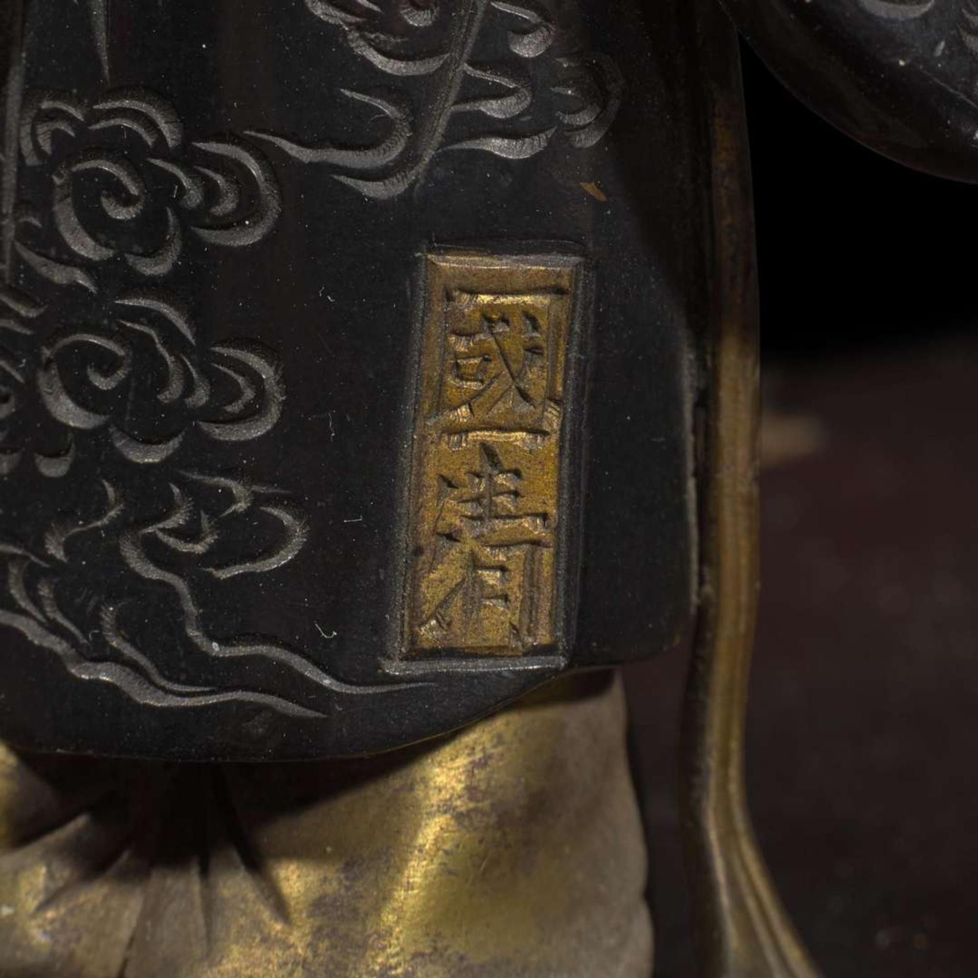 A Japanese patinated metal okimono signed Kunikiyo 日本金属置物 Meiji period ??