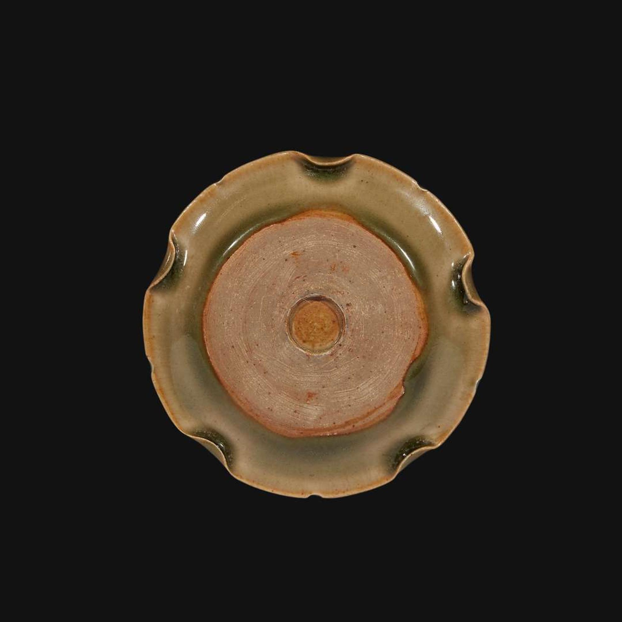 A small Yaozhou molded and carved lobed celadon dish Northern Song Dynasty