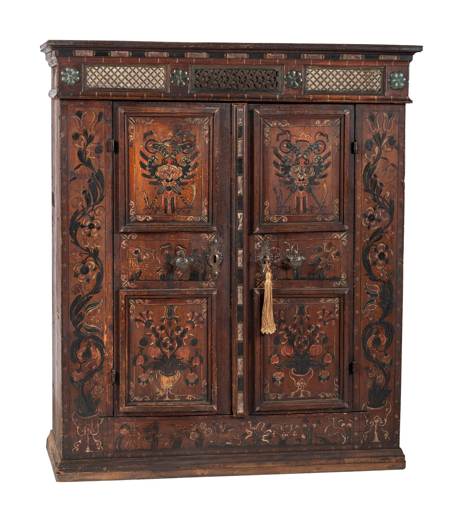 A Continental Carved and Paint Decorated Wardrobe