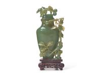A Chinese Carved Celadon Hardstone "Bird and Fruits" Flower Vase and Cover