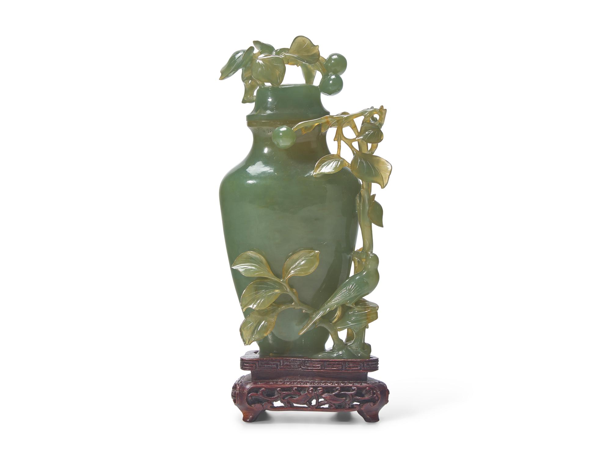 A Chinese Carved Celadon Hardstone "Bird and Fruits" Flower Vase and Cover