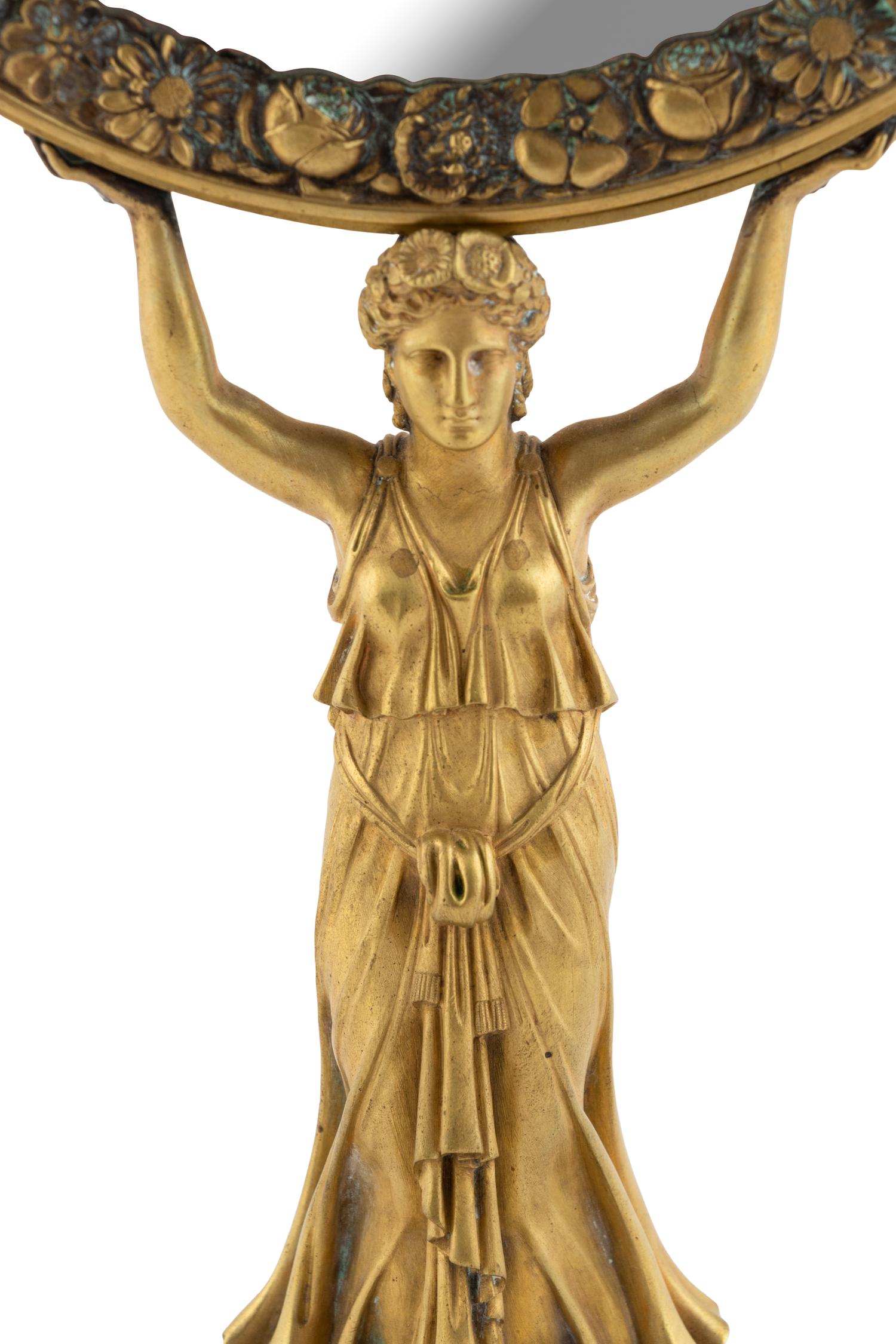 A French Neoclassical Gilt Bronze Dressing Mirror