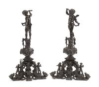 A Pair of Renaissance Revival Patinated Bronze Chenets Height 35 inches. — LATE 19TH/EARLY 20TH CENTURY