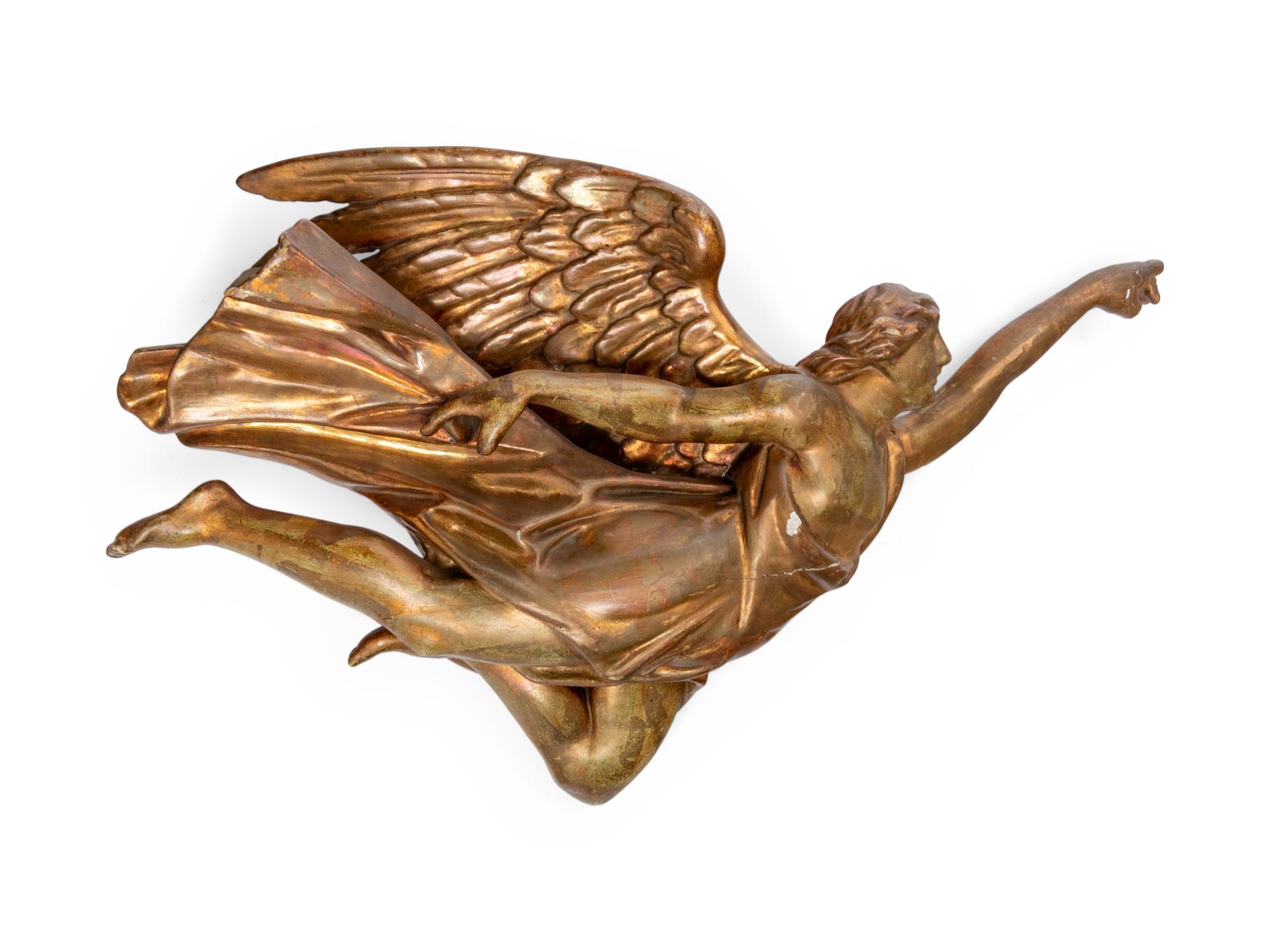 A Pair of Continental Carved Angel Figures