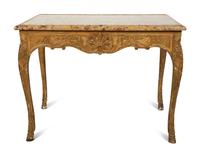 A Louis XV Giltwood Marble Top Side Table — CIRCA 1725