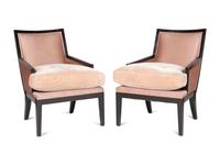 A Pair of Ebonised Bergères