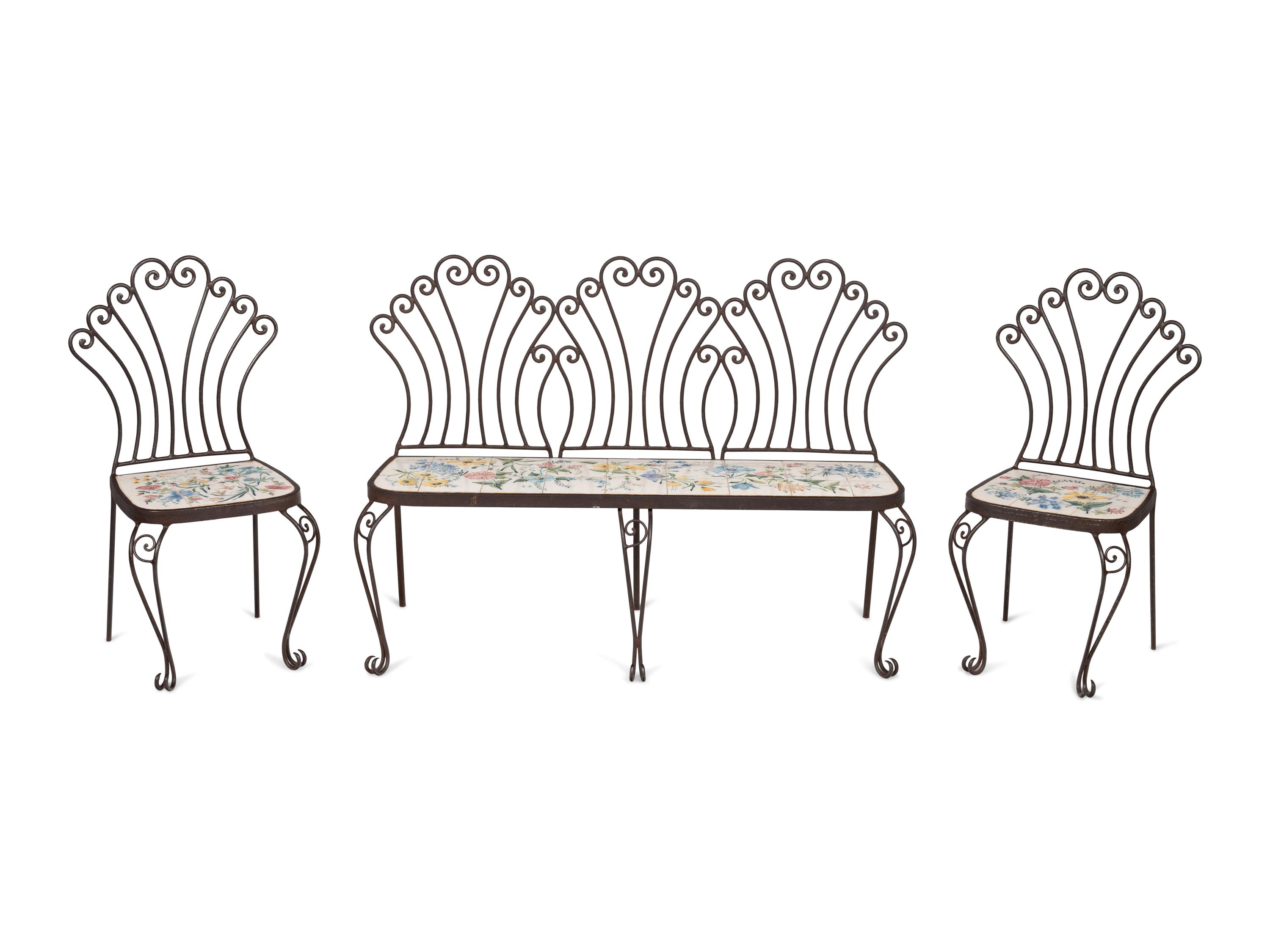 A Wrought Iron and Tile Bench and Pair of Chairs