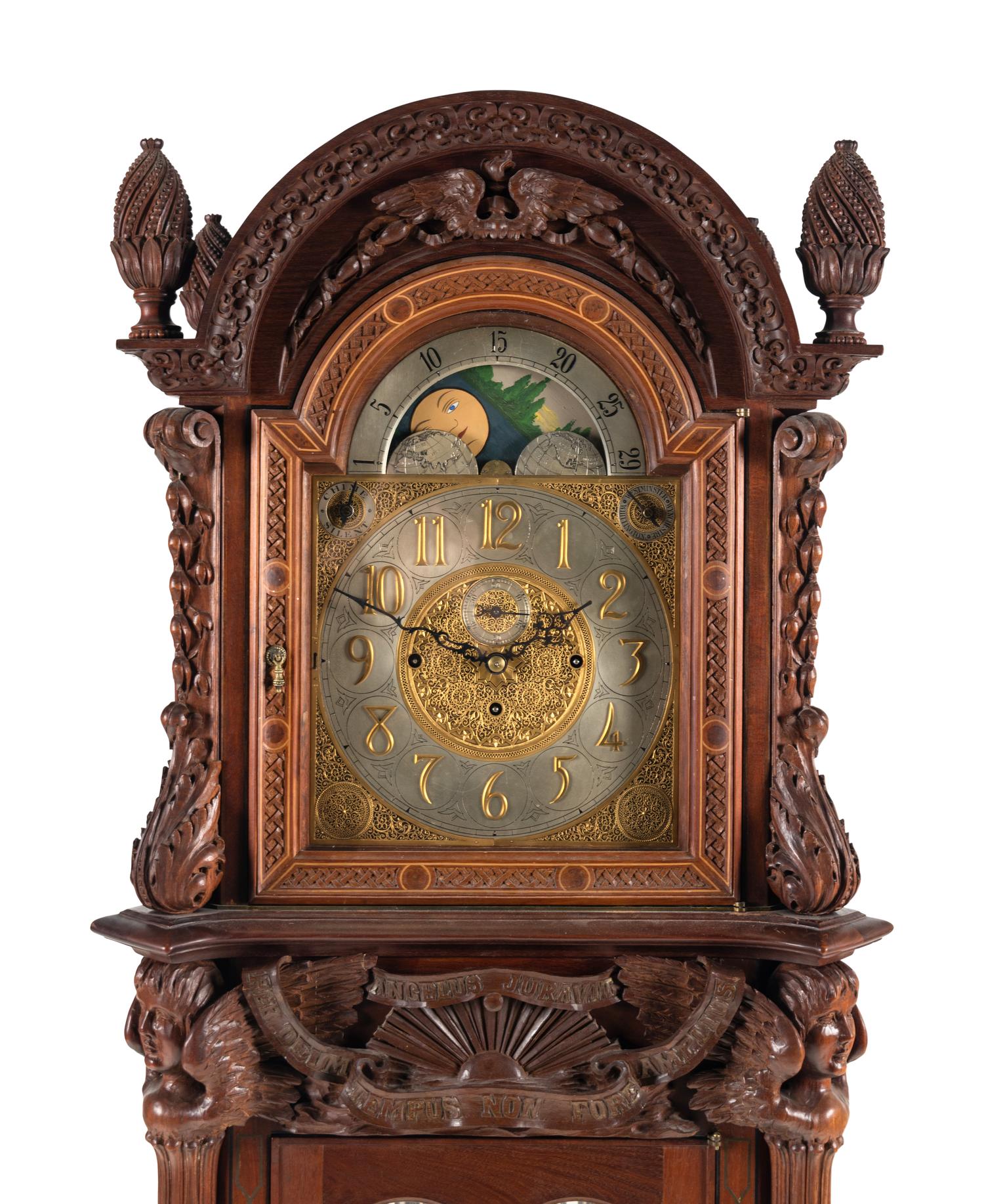 A Renaissance Revival Carved Mahogany Tube-Striking Tall Case Clock