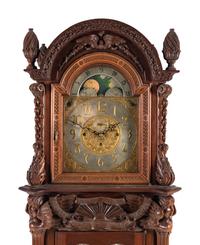 A Renaissance Revival Carved Mahogany Tube-Striking Tall Case Clock