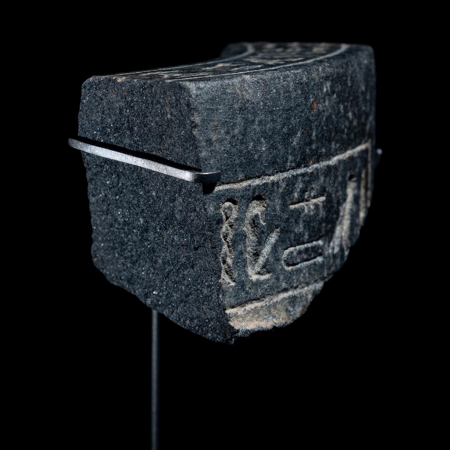 An Egyptian Granite Vessel Fragment with Hieroglyphs