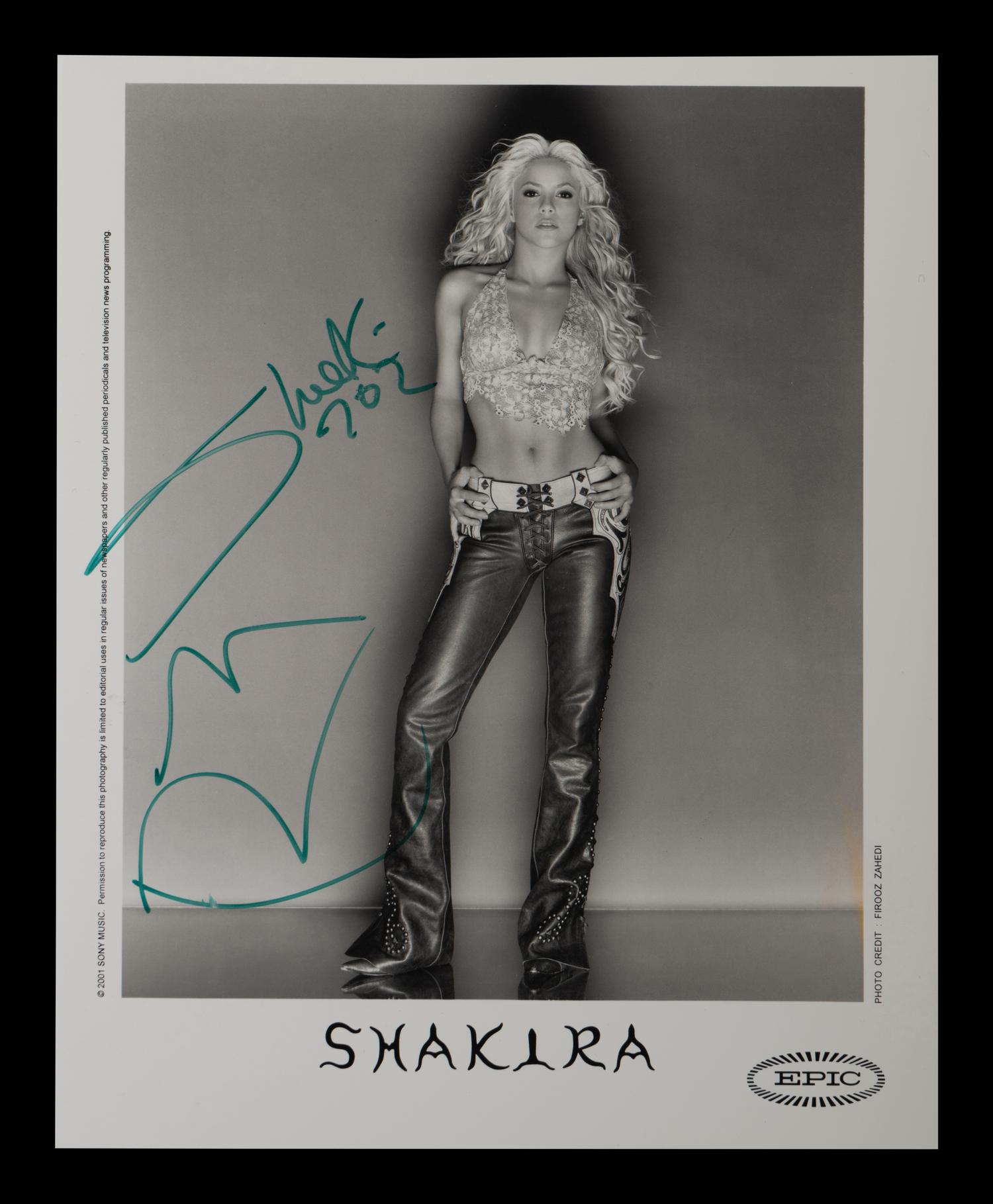 (Celebrity) A group of 10 autographed photos of musical stars, comprising: