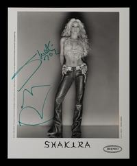 (Celebrity) A group of 10 autographed photos of musical stars, comprising: