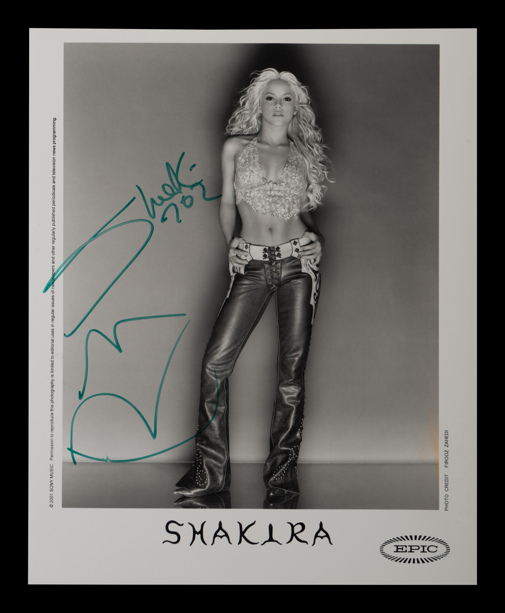 (Celebrity) A group of 10 autographed photos of musical stars, comprising: