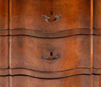 An Italian Walnut Three-Drawer Commode