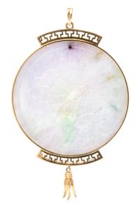 A 14 Karat Yellow Gold and Jade Pendant,