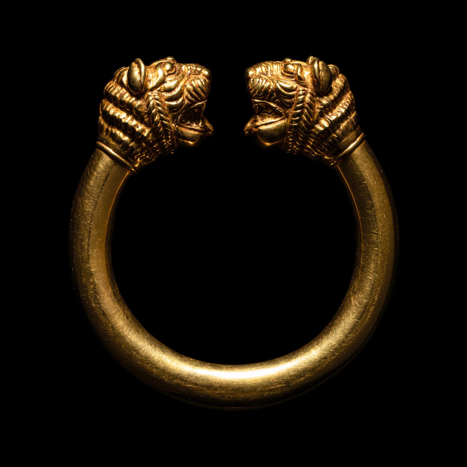 A Western Asiatic Gold Bracelet with Lion-Headed Terminals