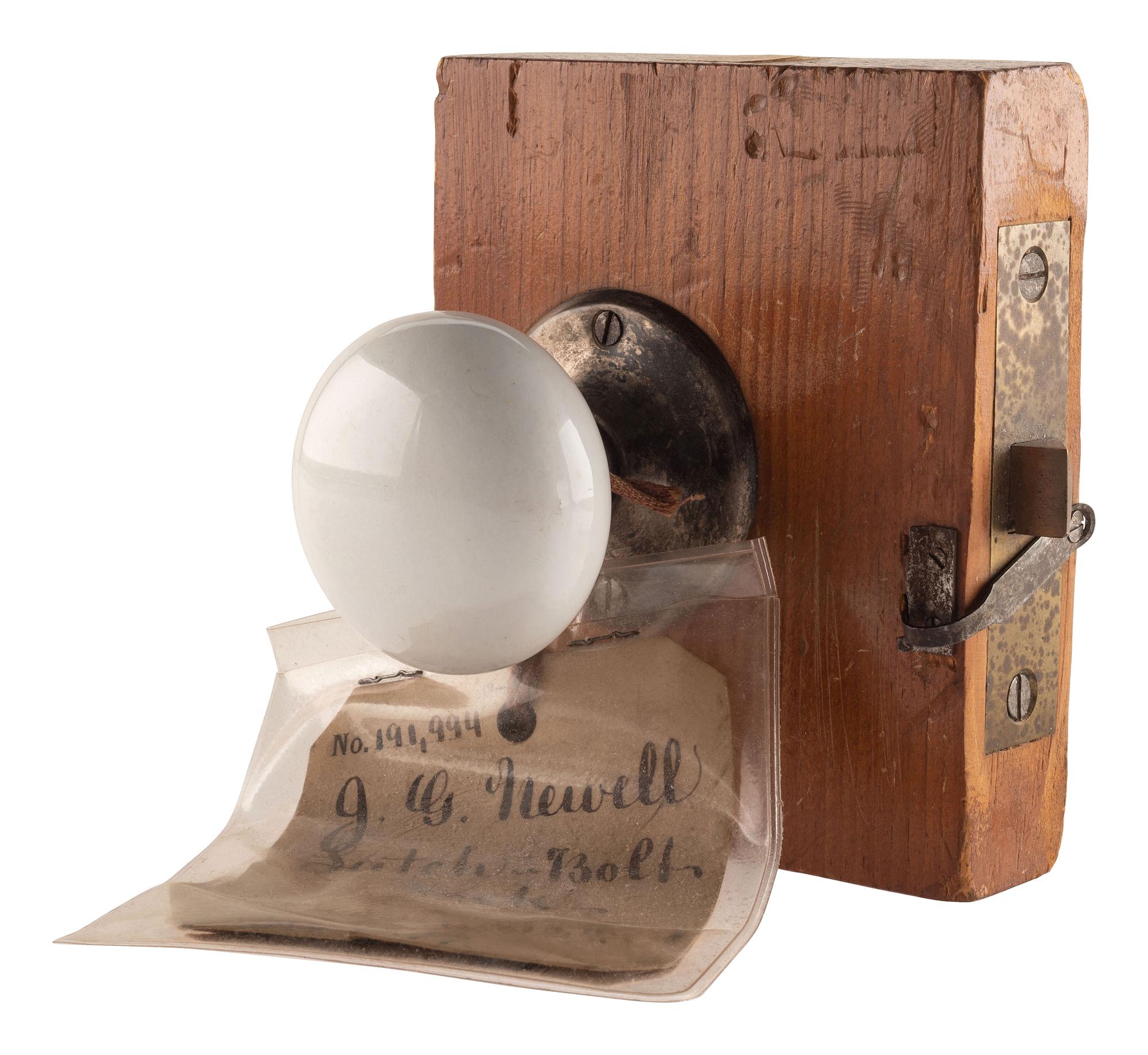 [SCIENCE & TECHNOLOGY]. J.G. Newell patent model for a "Latch-Bolt Lock" with original tags. New Haven, CT, 1877.