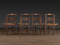 A Set of Four Classical 'Fancy' Stenciled Cane-Seat Side Chairs