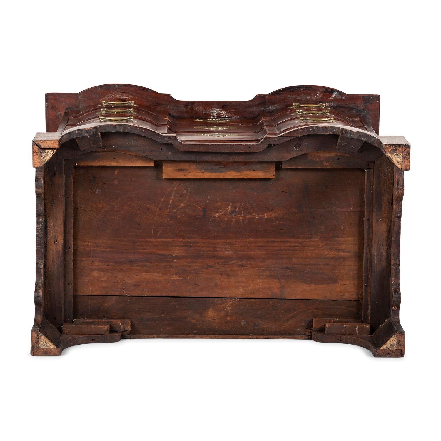 A Chippendale Figured Mahogany Block Front Chest of Drawers