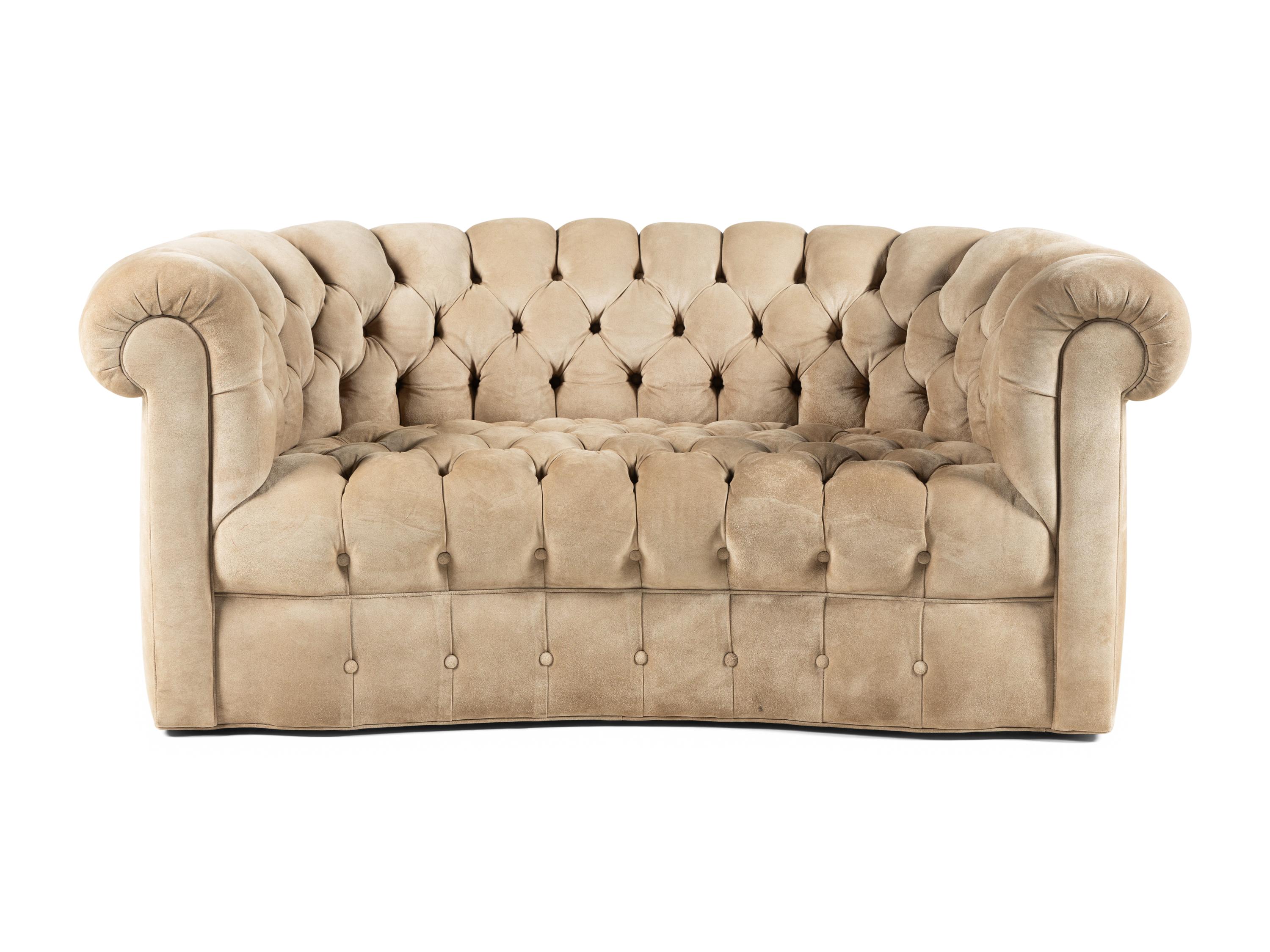 A Contemporary Suede-Upholstered Button-Tufted Chesterfield Sofa