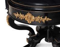 A Victorian Gilt Bronze Mounted Ebonized Center Table