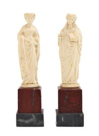 Two Continental Carved Ivory Figures, Height 6 inches.