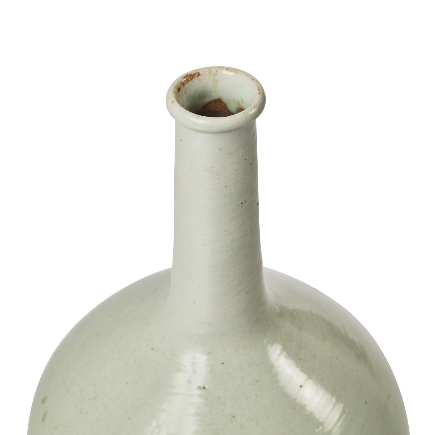 A Korean White Glazed Porcelain Tall-Neck Bottle Vase, Joseon Dynasty, 18th Century