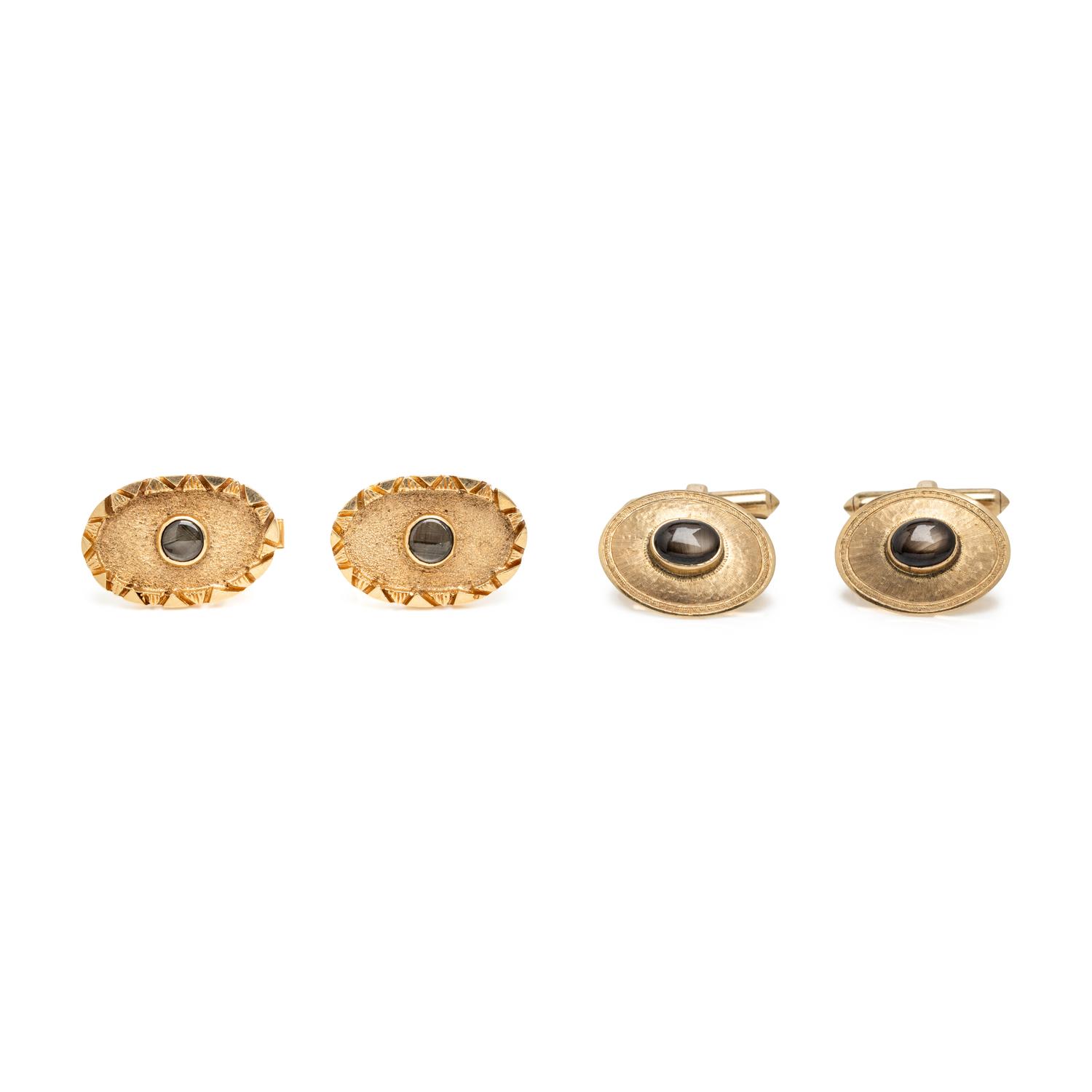 TWO PAIRS OF YELLOW GOLD AND BLACK STAR SAPPHIRE CUFFLINKS