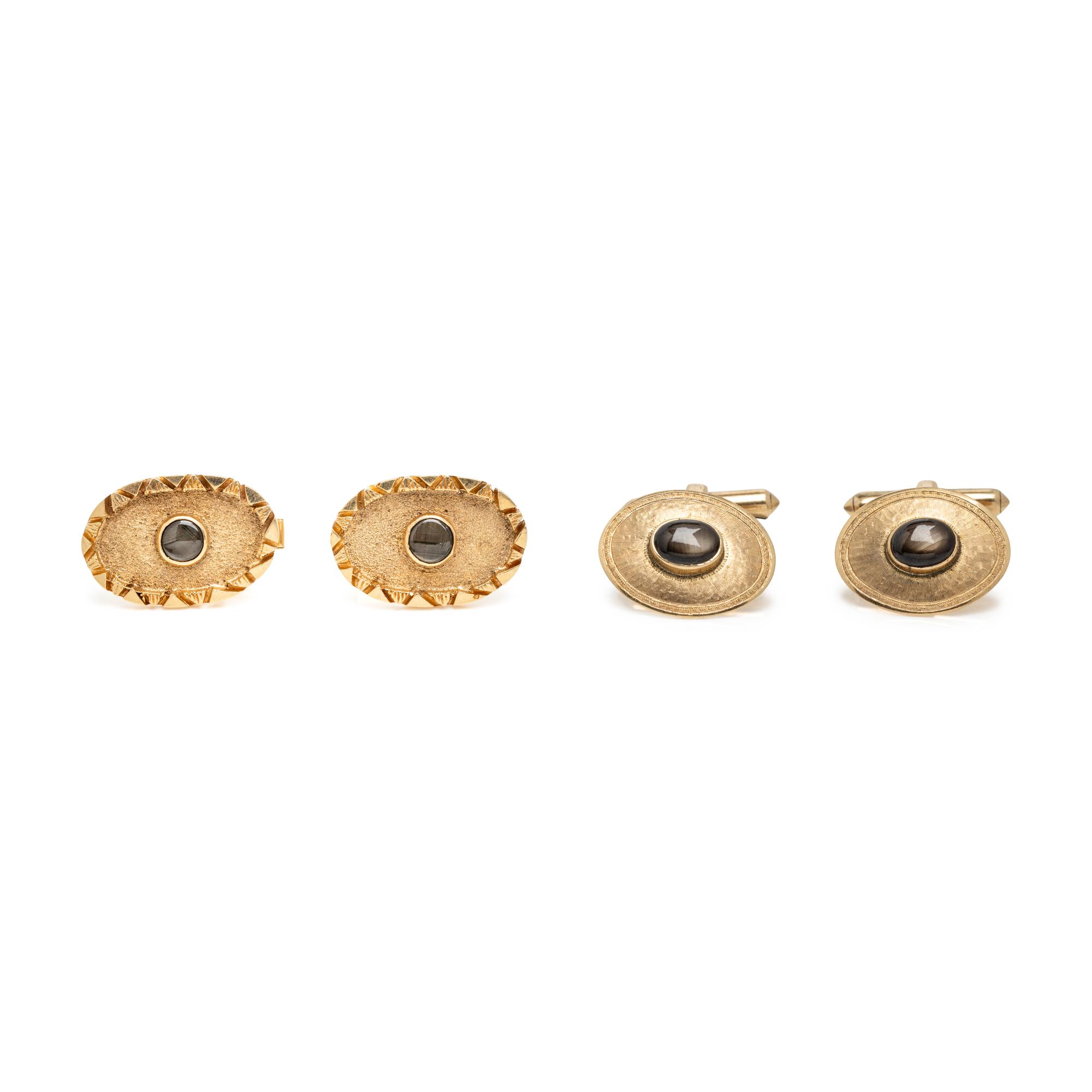 TWO PAIRS OF YELLOW GOLD AND BLACK STAR SAPPHIRE CUFFLINKS